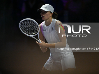 RIYADH, SAUDI ARABIA - NOVEMBER 05: Iga Swiatek of Poland during her match against Coco Gauff of USA, on day 4 of the 2024 WTA Finals, part...