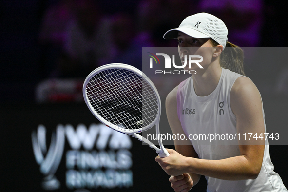 RIYADH, SAUDI ARABIA - NOVEMBER 05: Iga Swiatek of Poland during her match against Coco Gauff of USA, on day 4 of the 2024 WTA Finals, part...