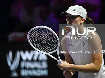 RIYADH, SAUDI ARABIA - NOVEMBER 05: Iga Swiatek of Poland during her match against Coco Gauff of USA, on day 4 of the 2024 WTA Finals, part...