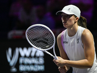 RIYADH, SAUDI ARABIA - NOVEMBER 05: Iga Swiatek of Poland during her match against Coco Gauff of USA, on day 4 of the 2024 WTA Finals, part...