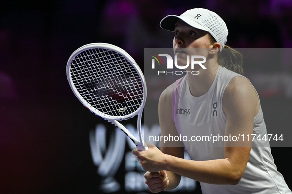 RIYADH, SAUDI ARABIA - NOVEMBER 05: Iga Swiatek of Poland during her match against Coco Gauff of USA, on day 4 of the 2024 WTA Finals, part...