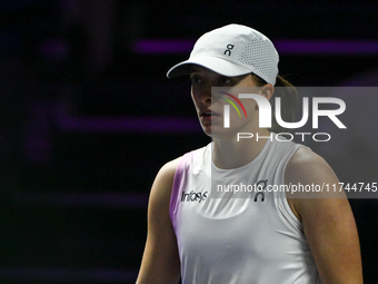 RIYADH, SAUDI ARABIA - NOVEMBER 05: Iga Swiatek of Poland during her match against Coco Gauff of USA, on day 4 of the 2024 WTA Finals, part...