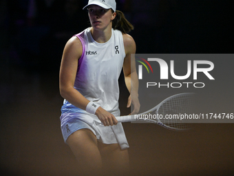 RIYADH, SAUDI ARABIA - NOVEMBER 05: Iga Swiatek of Poland during her match against Coco Gauff of USA, on day 4 of the 2024 WTA Finals, part...