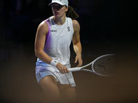 RIYADH, SAUDI ARABIA - NOVEMBER 05: Iga Swiatek of Poland during her match against Coco Gauff of USA, on day 4 of the 2024 WTA Finals, part...