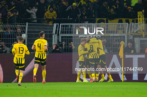 Donyell Malen of Borussia Dortmund  celebrates the teams first goal during the Champions League Round 4 match between Borussia Dortmund v SK...