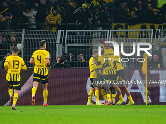 Donyell Malen of Borussia Dortmund  celebrates the teams first goal during the Champions League Round 4 match between Borussia Dortmund v SK...