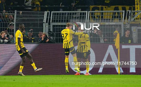 Donyell Malen of Borussia Dortmund  celebrates the teams first goal during the Champions League Round 4 match between Borussia Dortmund v SK...