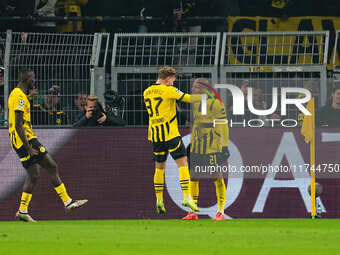 Donyell Malen of Borussia Dortmund  celebrates the teams first goal during the Champions League Round 4 match between Borussia Dortmund v SK...