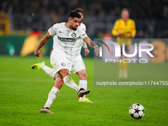 Jusuf Gazibegovic of SK Sturm Graz  shoots on goal during the Champions League Round 4 match between Borussia Dortmund v SK Sturm Graz at th...