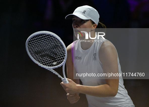 RIYADH, SAUDI ARABIA - NOVEMBER 05: Iga Swiatek of Poland during her match against Coco Gauff of USA, on day 4 of the 2024 WTA Finals, part...