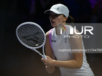 RIYADH, SAUDI ARABIA - NOVEMBER 05: Iga Swiatek of Poland during her match against Coco Gauff of USA, on day 4 of the 2024 WTA Finals, part...