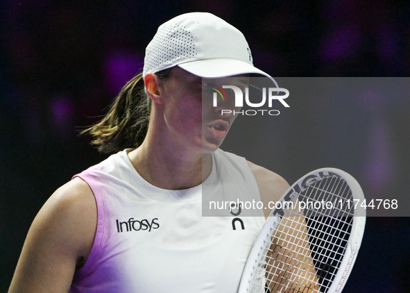 RIYADH, SAUDI ARABIA - NOVEMBER 05: Iga Swiatek of Poland during her match against Coco Gauff of USA, on day 4 of the 2024 WTA Finals, part...