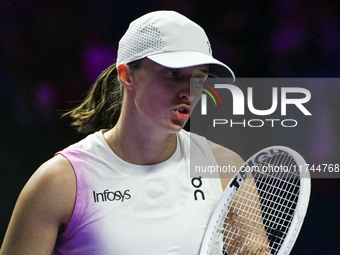 RIYADH, SAUDI ARABIA - NOVEMBER 05: Iga Swiatek of Poland during her match against Coco Gauff of USA, on day 4 of the 2024 WTA Finals, part...