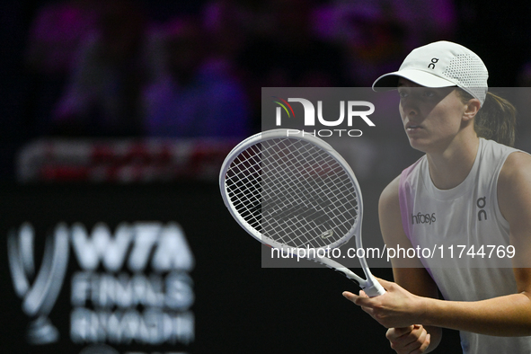 RIYADH, SAUDI ARABIA - NOVEMBER 05: Iga Swiatek of Poland during her match against Coco Gauff of USA, on day 4 of the 2024 WTA Finals, part...