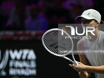 RIYADH, SAUDI ARABIA - NOVEMBER 05: Iga Swiatek of Poland during her match against Coco Gauff of USA, on day 4 of the 2024 WTA Finals, part...