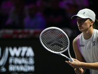 RIYADH, SAUDI ARABIA - NOVEMBER 05: Iga Swiatek of Poland during her match against Coco Gauff of USA, on day 4 of the 2024 WTA Finals, part...