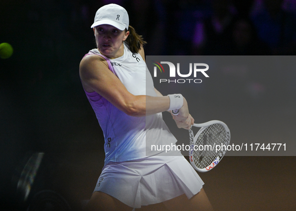 RIYADH, SAUDI ARABIA - NOVEMBER 05: Iga Swiatek of Poland during her match against Coco Gauff of USA, on day 4 of the 2024 WTA Finals, part...