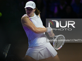 RIYADH, SAUDI ARABIA - NOVEMBER 05: Iga Swiatek of Poland during her match against Coco Gauff of USA, on day 4 of the 2024 WTA Finals, part...