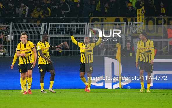 Donyell Malen of Borussia Dortmund  celebrates the teams first goal during the Champions League Round 4 match between Borussia Dortmund v SK...