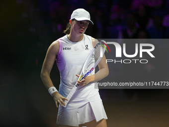 RIYADH, SAUDI ARABIA - NOVEMBER 05: Iga Swiatek of Poland during her match against Coco Gauff of USA, on day 4 of the 2024 WTA Finals, part...