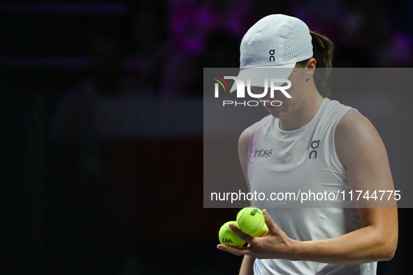 RIYADH, SAUDI ARABIA - NOVEMBER 05: Iga Swiatek of Poland during her match against Coco Gauff of USA, on day 4 of the 2024 WTA Finals, part...