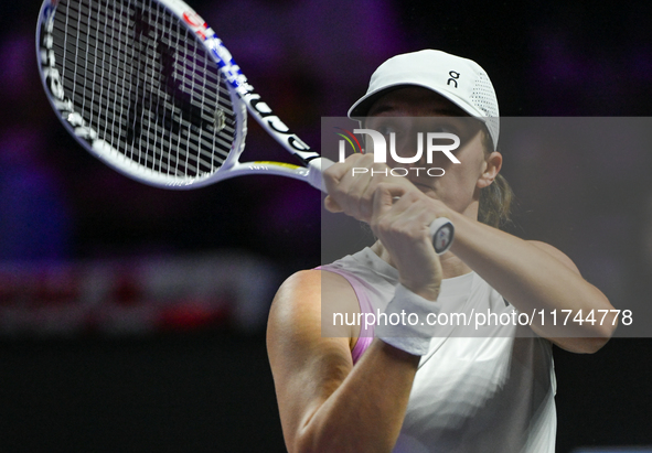 RIYADH, SAUDI ARABIA - NOVEMBER 05: Iga Swiatek of Poland during her match against Coco Gauff of USA, on day 4 of the 2024 WTA Finals, part...