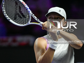 RIYADH, SAUDI ARABIA - NOVEMBER 05: Iga Swiatek of Poland during her match against Coco Gauff of USA, on day 4 of the 2024 WTA Finals, part...