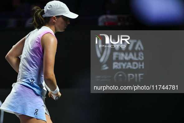 RIYADH, SAUDI ARABIA - NOVEMBER 05: Iga Swiatek of Poland during her match against Coco Gauff of USA, on day 4 of the 2024 WTA Finals, part...