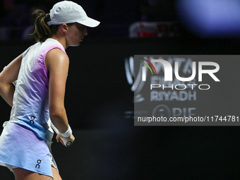 RIYADH, SAUDI ARABIA - NOVEMBER 05: Iga Swiatek of Poland during her match against Coco Gauff of USA, on day 4 of the 2024 WTA Finals, part...