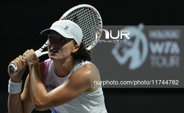 RIYADH, SAUDI ARABIA - NOVEMBER 05: Iga Swiatek of Poland during her match against Coco Gauff of USA, on day 4 of the 2024 WTA Finals, part...