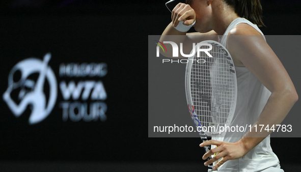 RIYADH, SAUDI ARABIA - NOVEMBER 05: Iga Swiatek of Poland during her match against Coco Gauff of USA, on day 4 of the 2024 WTA Finals, part...