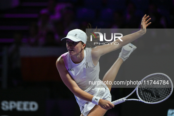 RIYADH, SAUDI ARABIA - NOVEMBER 05: Iga Swiatek of Poland during her match against Coco Gauff of USA, on day 4 of the 2024 WTA Finals, part...