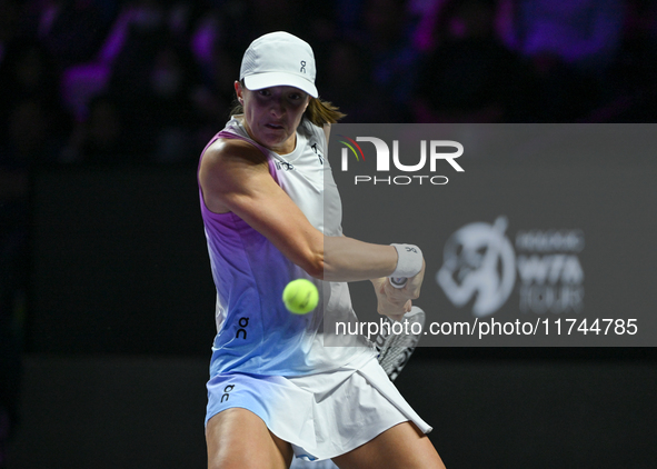 RIYADH, SAUDI ARABIA - NOVEMBER 05: Iga Swiatek of Poland during her match against Coco Gauff of USA, on day 4 of the 2024 WTA Finals, part...