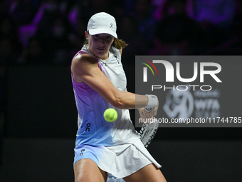 RIYADH, SAUDI ARABIA - NOVEMBER 05: Iga Swiatek of Poland during her match against Coco Gauff of USA, on day 4 of the 2024 WTA Finals, part...