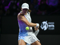 RIYADH, SAUDI ARABIA - NOVEMBER 05: Iga Swiatek of Poland during her match against Coco Gauff of USA, on day 4 of the 2024 WTA Finals, part...