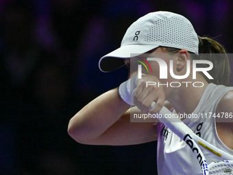 RIYADH, SAUDI ARABIA - NOVEMBER 05: Iga Swiatek of Poland during her match against Coco Gauff of USA, on day 4 of the 2024 WTA Finals, part...