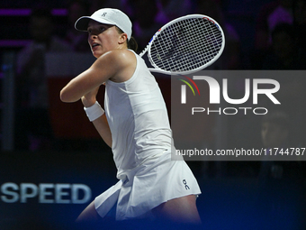 RIYADH, SAUDI ARABIA - NOVEMBER 05: Iga Swiatek of Poland during her match against Coco Gauff of USA, on day 4 of the 2024 WTA Finals, part...