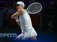 RIYADH, SAUDI ARABIA - NOVEMBER 05: Iga Swiatek of Poland during her match against Coco Gauff of USA, on day 4 of the 2024 WTA Finals, part...