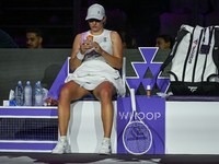 RIYADH, SAUDI ARABIA - NOVEMBER 05: Iga Swiatek of Poland during her match against Coco Gauff of USA, on day 4 of the 2024 WTA Finals, part...