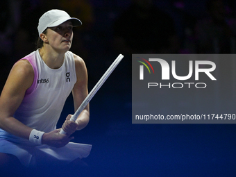 RIYADH, SAUDI ARABIA - NOVEMBER 05: Iga Swiatek of Poland during her match against Coco Gauff of USA, on day 4 of the 2024 WTA Finals, part...