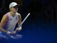 RIYADH, SAUDI ARABIA - NOVEMBER 05: Iga Swiatek of Poland during her match against Coco Gauff of USA, on day 4 of the 2024 WTA Finals, part...