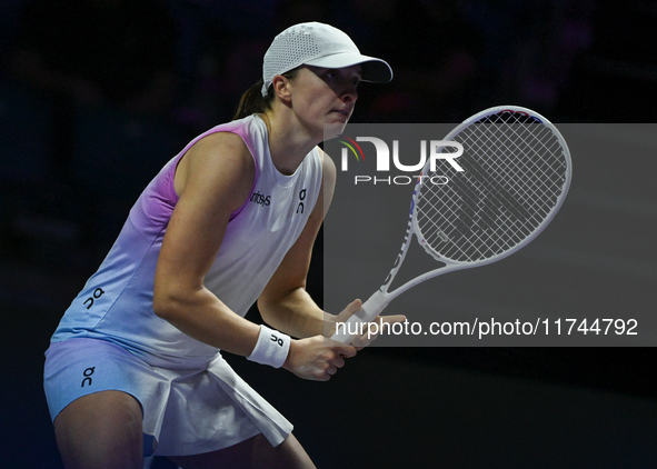 RIYADH, SAUDI ARABIA - NOVEMBER 05: Iga Swiatek of Poland during her match against Coco Gauff of USA, on day 4 of the 2024 WTA Finals, part...