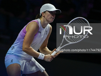 RIYADH, SAUDI ARABIA - NOVEMBER 05: Iga Swiatek of Poland during her match against Coco Gauff of USA, on day 4 of the 2024 WTA Finals, part...