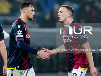 Lewis Ferguson of Bologna FC and Sam Beukema of Bologna FC during the UEFA Champions League 2024/25 League Phase MD4 match between Bologna F...