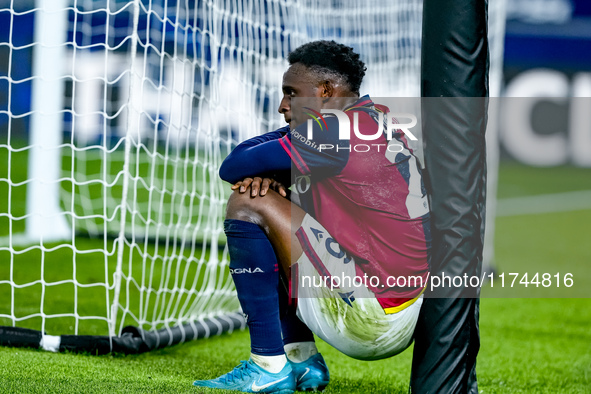 Jhon Lucumi of Bologna FC looks dejected at the end of the UEFA Champions League 2024/25 League Phase MD4 match between Bologna FC and AS Mo...