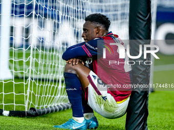 Jhon Lucumi of Bologna FC looks dejected at the end of the UEFA Champions League 2024/25 League Phase MD4 match between Bologna FC and AS Mo...