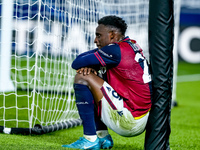 Jhon Lucumi of Bologna FC looks dejected at the end of the UEFA Champions League 2024/25 League Phase MD4 match between Bologna FC and AS Mo...