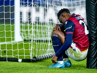 Jhon Lucumi of Bologna FC looks dejected at the end of the UEFA Champions League 2024/25 League Phase MD4 match between Bologna FC and AS Mo...