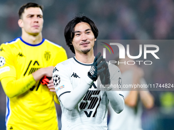 Takumi Minamino of AS Monaco greets the fans during the UEFA Champions League 2024/25 League Phase MD4 match between Bologna FC and AS Monac...