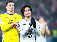 Takumi Minamino of AS Monaco greets the fans during the UEFA Champions League 2024/25 League Phase MD4 match between Bologna FC and AS Monac...